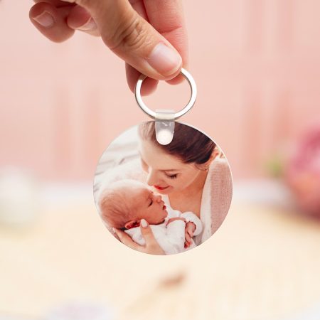 Llavero redondo de plástico con la frase 'Mejor madre del mundo' y una foto en el reverso