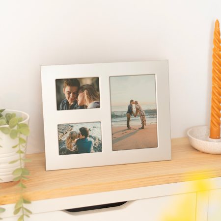 Marco de aluminio para 4 fotos, una en 10x15 y dos en 6x9 cm.